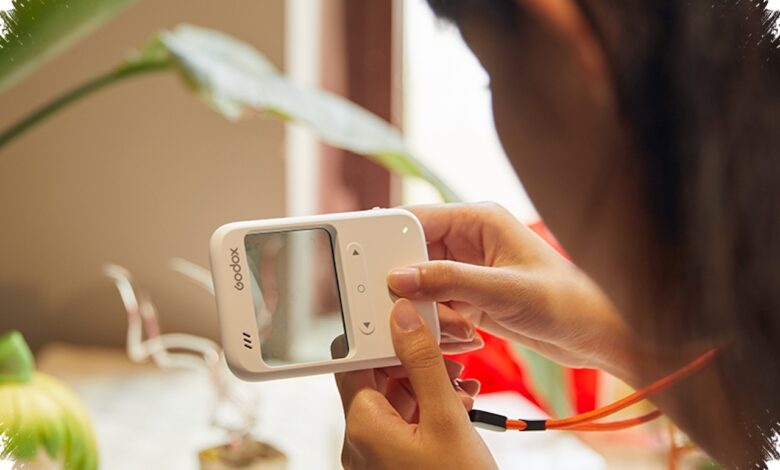 Godox C100 Looks Like an iPod, but Its Transparent Display Reveals a Strange Extra Trick